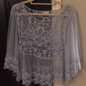 A super cute sheer boutique top